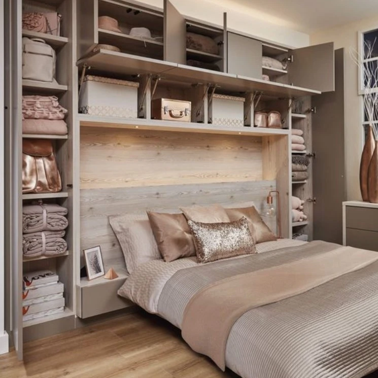 
If you need to increase the storage room in your house or apartment, take a look at such an interesting option as a bespoke fitted wardrobe behind the headboard in the bedroom. It may become a very important part of your bedroom furniture.